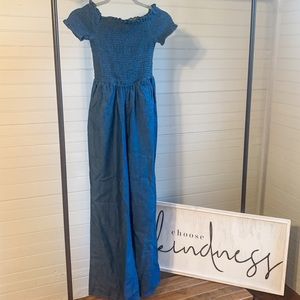 Jean material jumpsuit with pockets